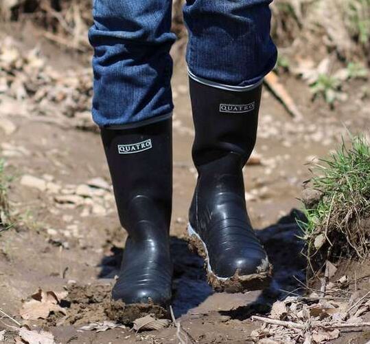 Quatro Boots walking in mud